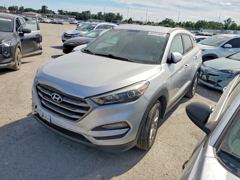 HYUNDAI TUCSON 2016 with VIN KM8J33A40GU135167 - Photo from auction