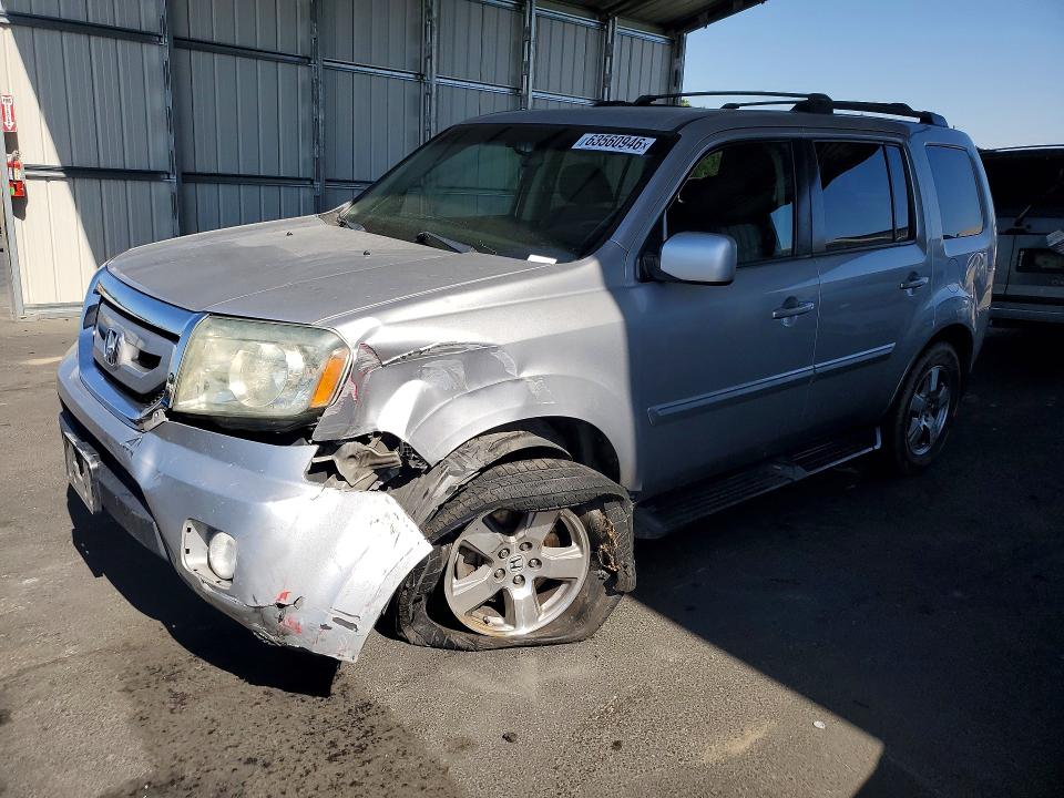 HONDA PILOT 2011 with VIN 5FNYF3H41BB024645 - Photo from auction
