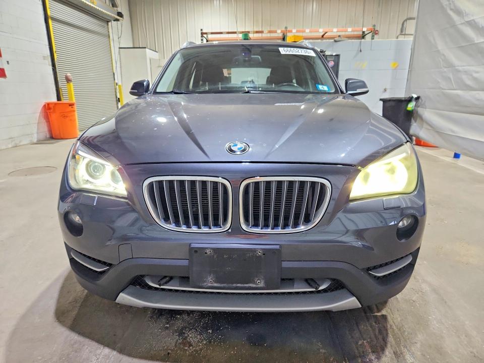 Foto 5 de la subasta – 2013 BMW X1 con VIN WBAVM5C57DVV89682
