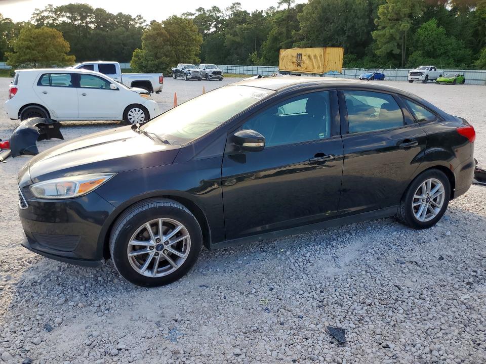 FORD FOCUS 2015 with VIN 1FADP3F27FL335258 - Photo from auction