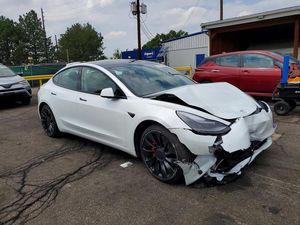 Photo 4 from auction – 2023 TESLA MODEL 3 with VIN 5YJ3E1EC4PF420671