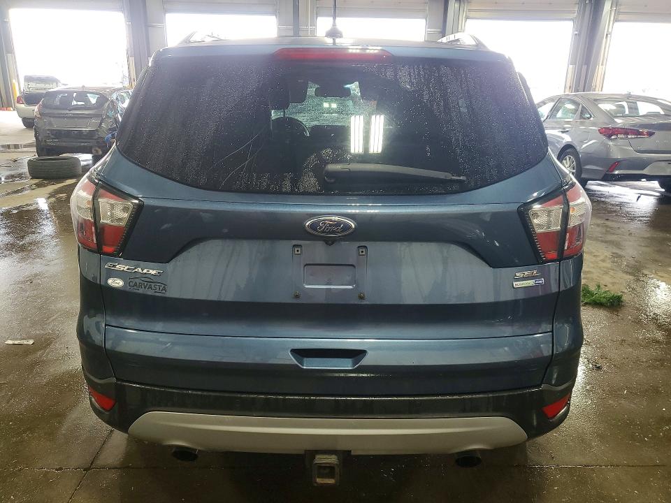 صورة رقم 6 من المزاد - 2018 FORD ESCAPE مع VIN 1FMCU9HD0JUB31447
