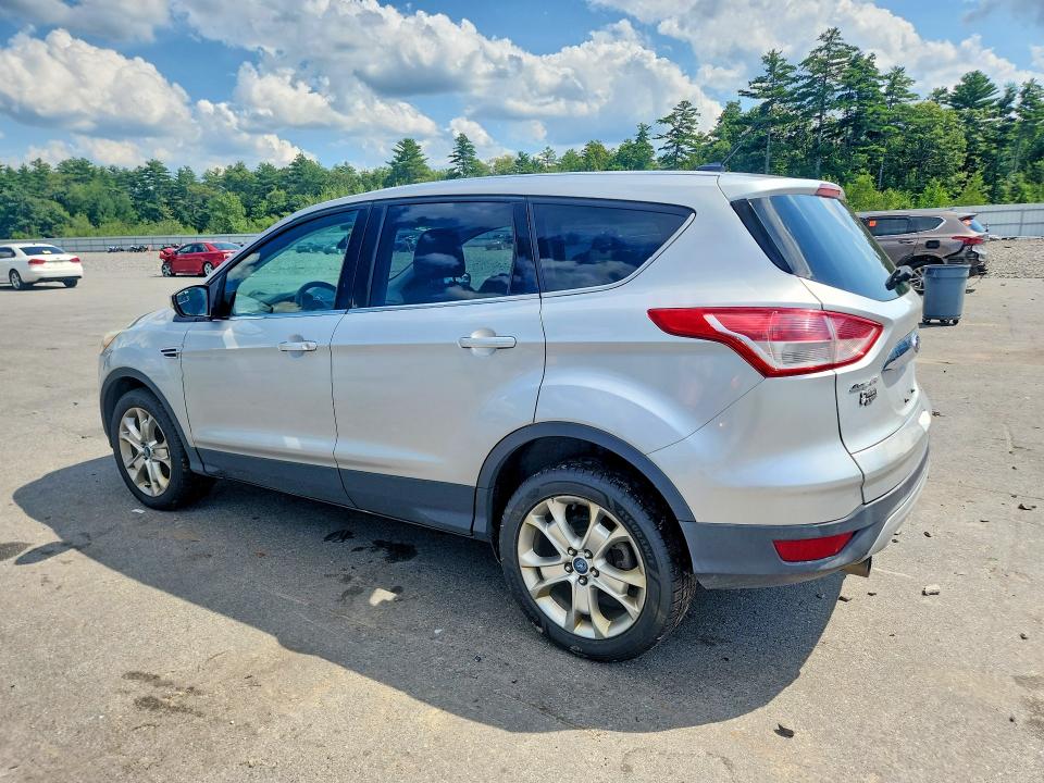 Photo 2 from auction – 2013 FORD ESCAPE with VIN 1FMCU9H97DUC95701