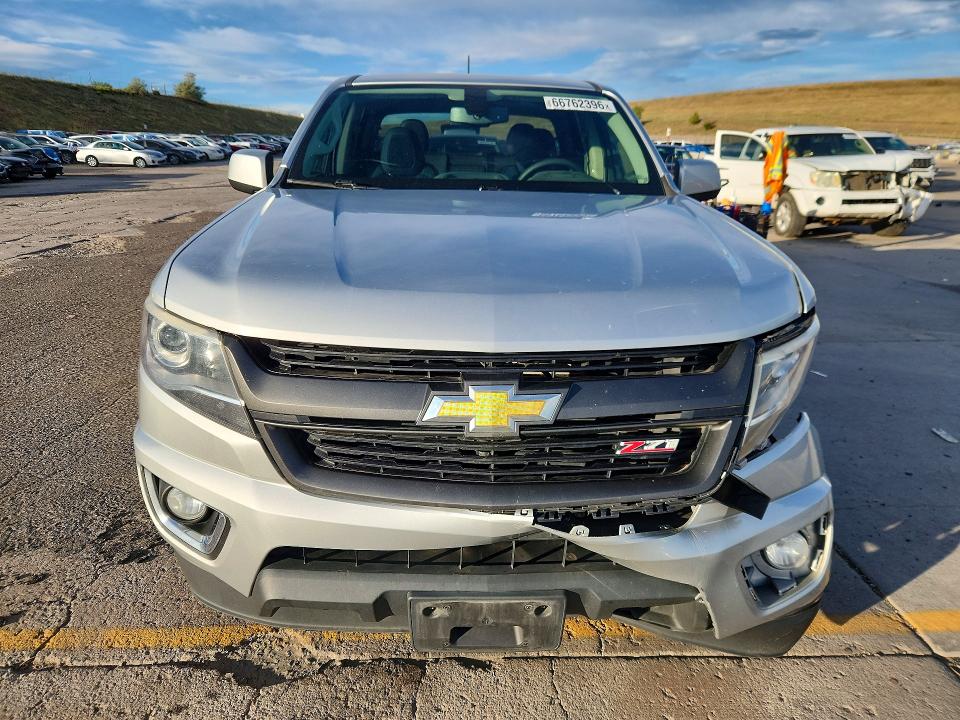 Снимка 5 от търг – 2015 CHEVROLET COLORADO с VIN 1GCGTCE37F1244158