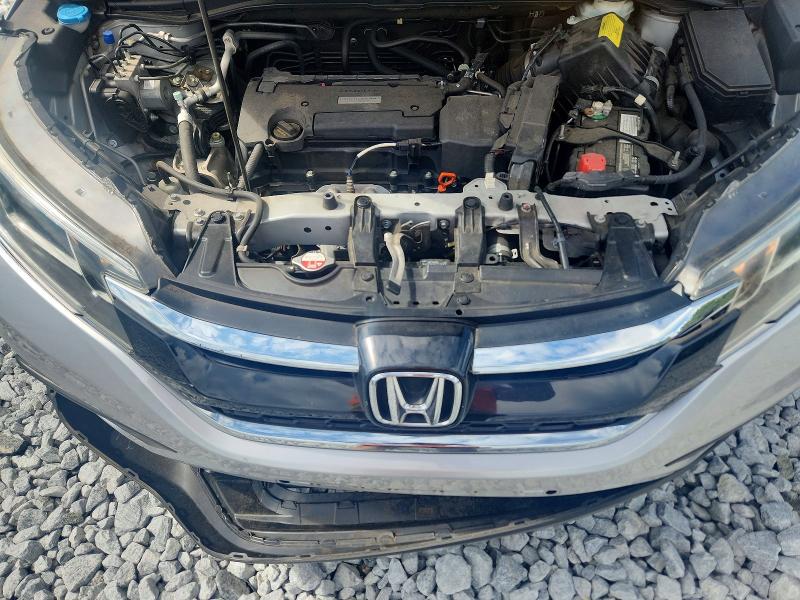 Photo 12 from auction – 2016 HONDA CR-V with VIN 2HKRM3H39GH562584
