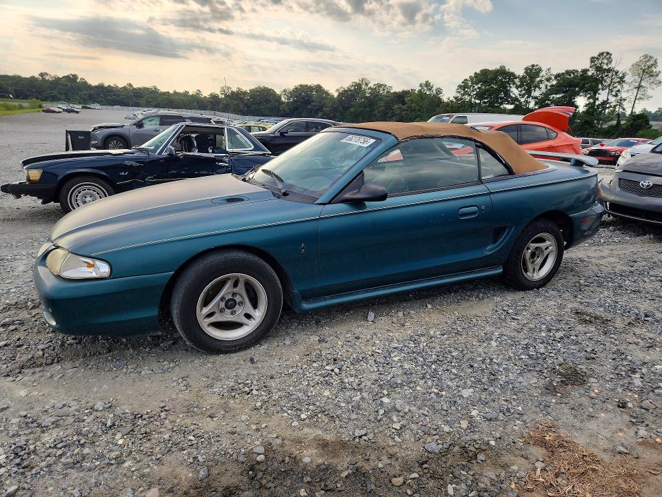 FORD MUSTANG 1996 with VIN 1FALP4447TF163409 - Photo from auction