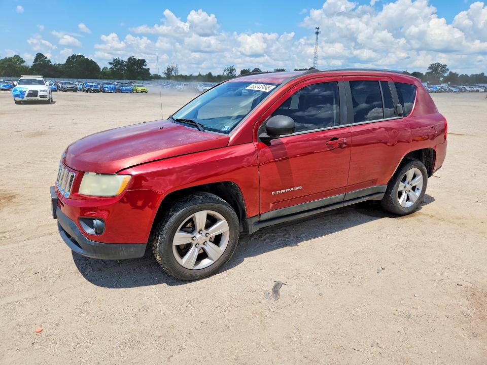JEEP COMPASS 2011 with VIN 1J4NF1FB8BD174620 - Photo from auction