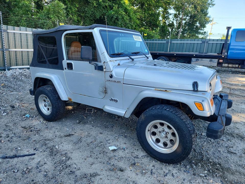 Photo 4 from auction – 2002 JEEP WRANGLER / TJ with VIN 1J4FA39S32P747092