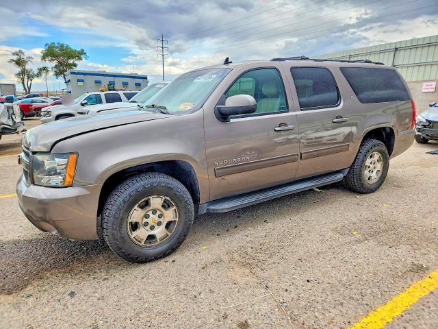CHEVROLET SUBURBAN 2014 with VIN 1GNSCJE08ER241815 - Photo from auction