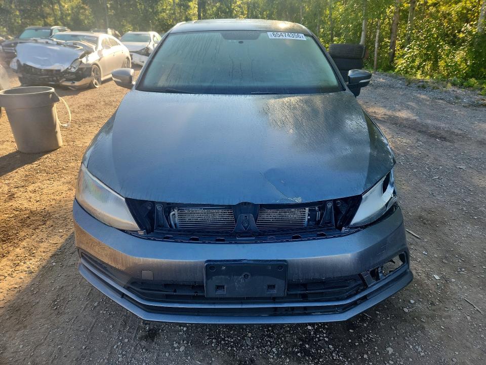 Photo 5 from auction – 2015 VOLKSWAGEN JETTA with VIN 3VWD07AJ0FM227273