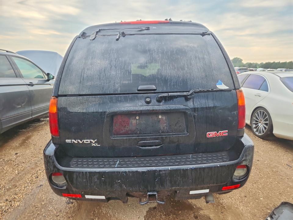 Photo 6 from auction – 2006 GMC ENVOY with VIN 1GKET66M166136125