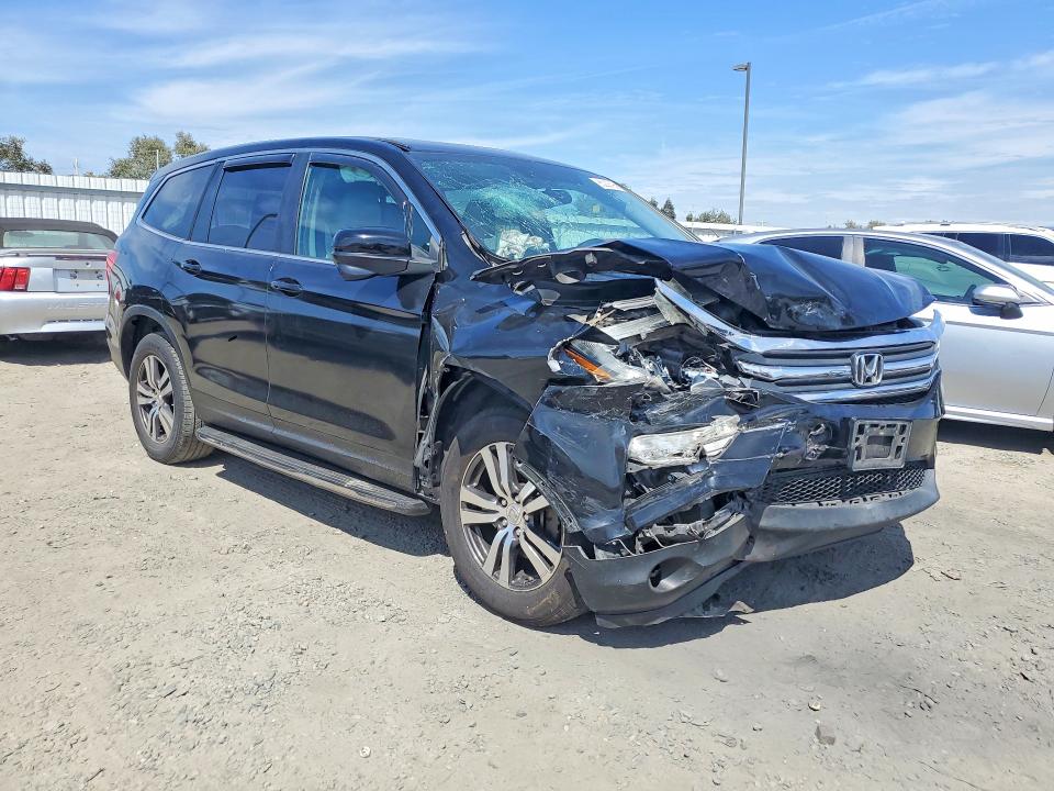 Photo 4 from auction – 2016 HONDA PILOT with VIN 5FNYF5H55GB034252