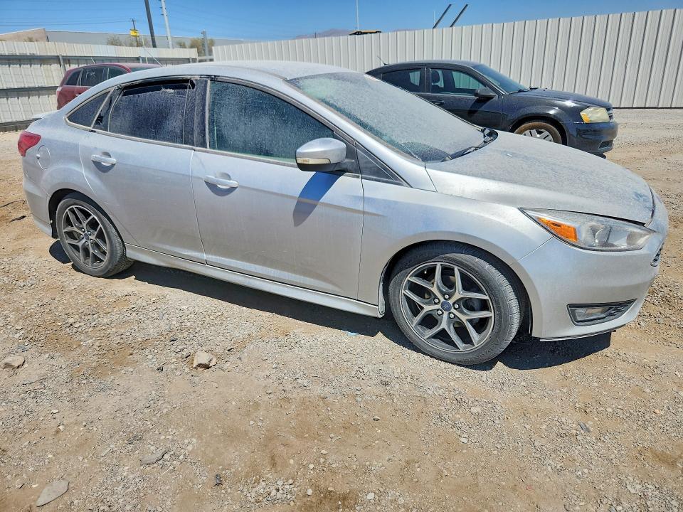 Photo 4 from auction – 2016 FORD FOCUS with VIN 1FADP3F23GL362815