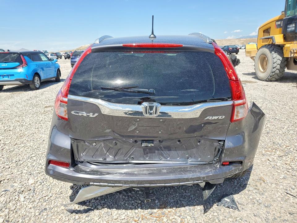Photo 6 from auction – 2016 HONDA CR-V with VIN 2HKRM4H79GH680563