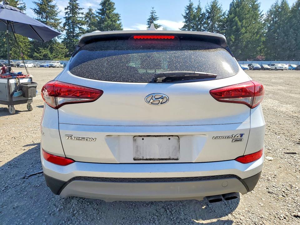 Photo 6 from auction – 2017 HYUNDAI TUCSON with VIN KM8J3CA29HU400409