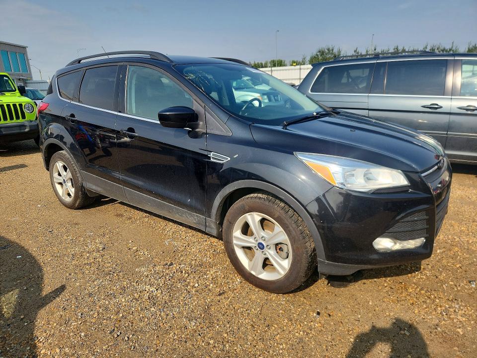 Photo 4 from auction – 2014 FORD ESCAPE with VIN 1FMCU9G97EUC95829