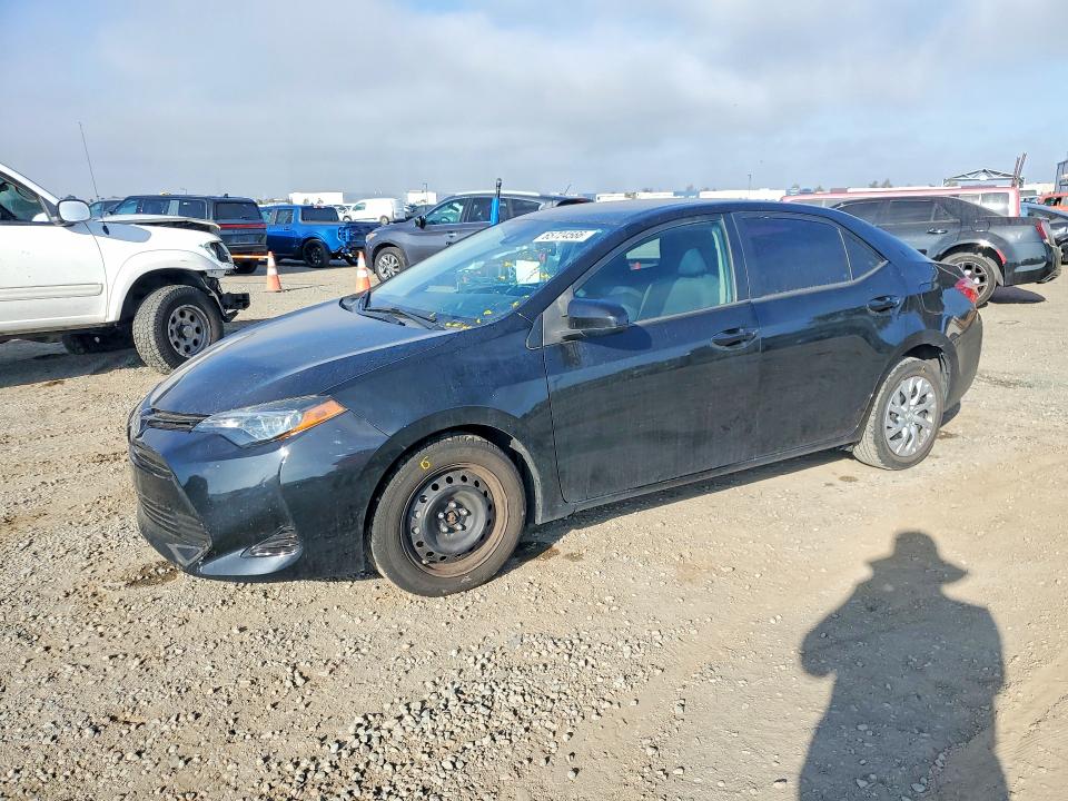 TOYOTA COROLLA 2018 with VIN 2T1BURHE6JC107787 - Photo from auction