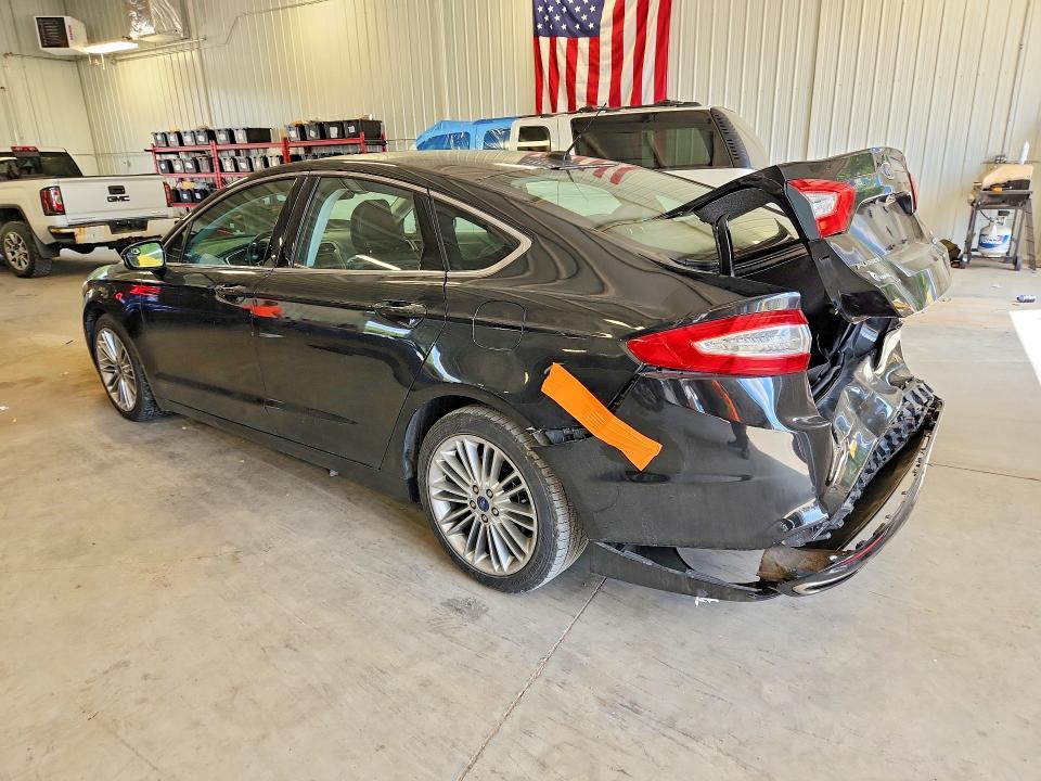 Photo 2 from auction – 2015 FORD FUSION with VIN 3FA6P0T98FR310752