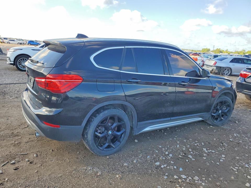 Photo 3 from auction – 2019 BMW X1 with VIN WBXHU7C52K5L10618