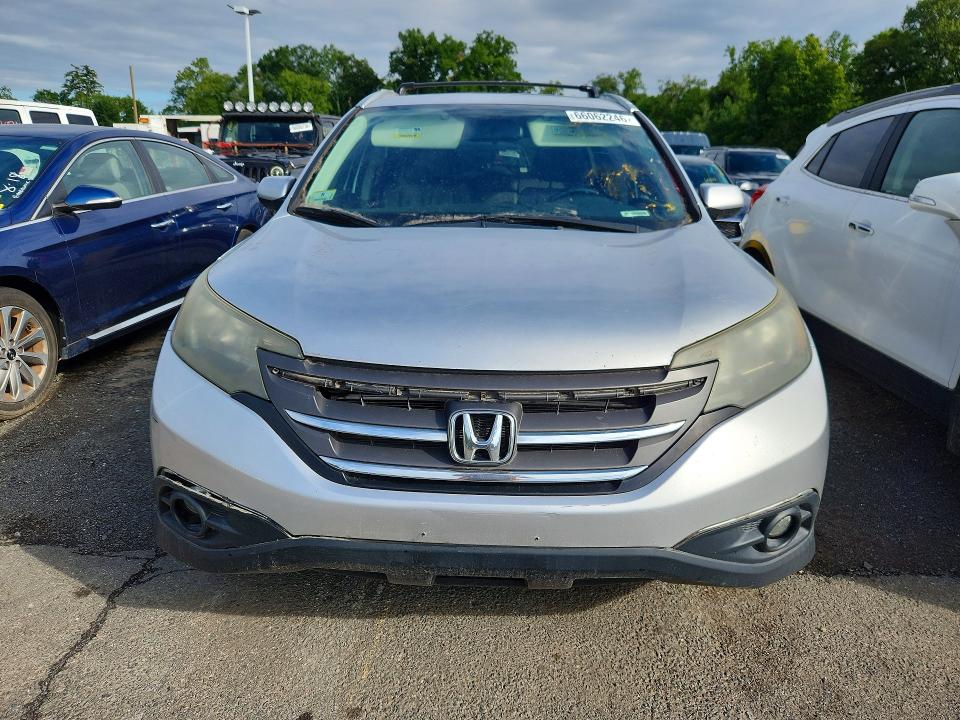 Photo 5 from auction – 2014 HONDA CR-V with VIN 2HKRM4H74EH640520