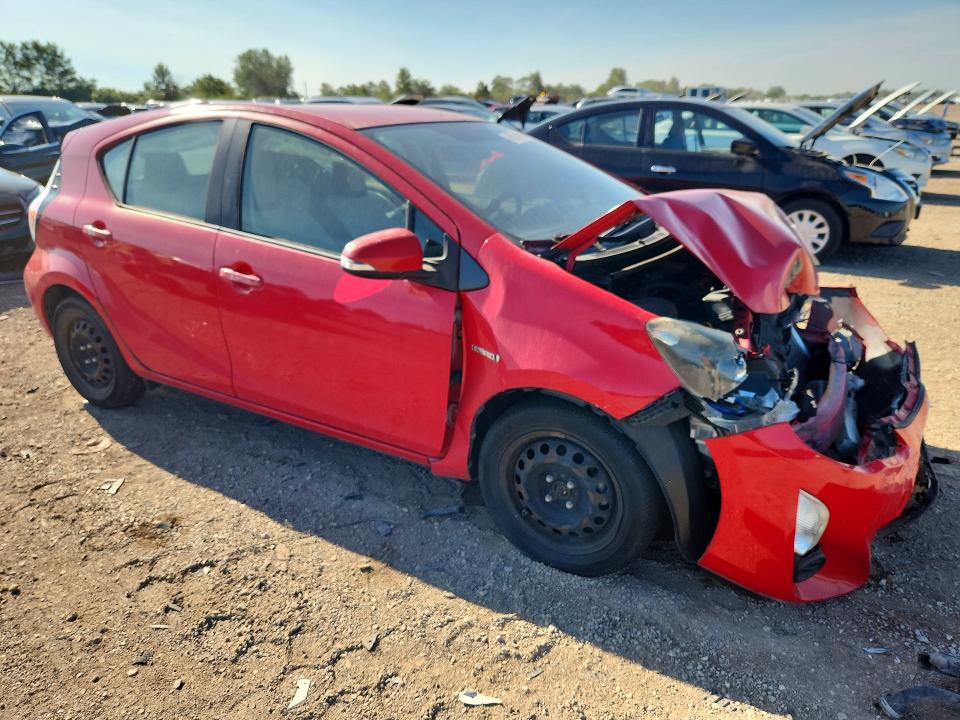 Photo 4 from auction – 2015 TOYOTA PRIUS C with VIN JTDKDTB38F1578551