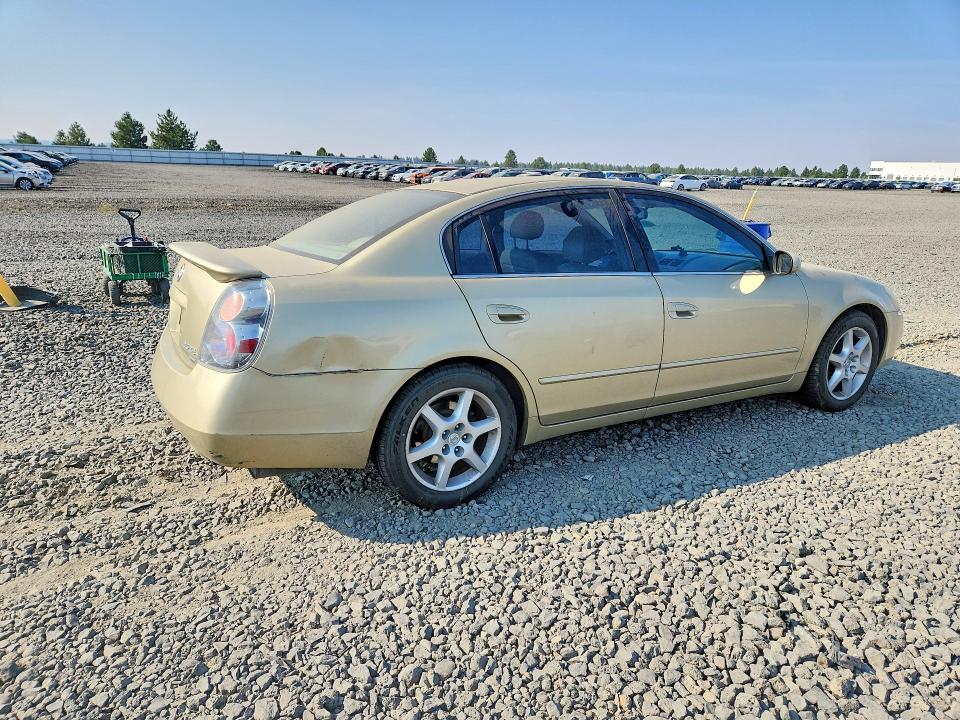 Photo 3 from auction – 2002 NISSAN ALTIMA with VIN 1N4BL11E72C129036