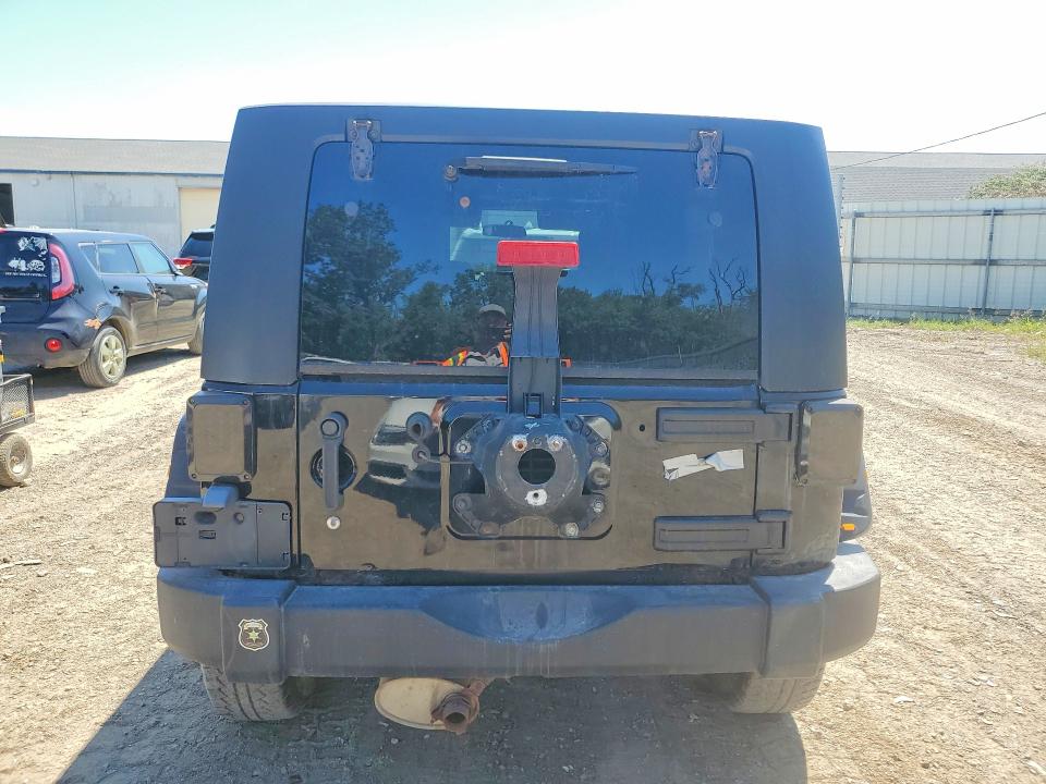Снимка 6 от търг – 2009 JEEP WRANGLER UNLIMITED с VIN 1J4GA391X9L705922