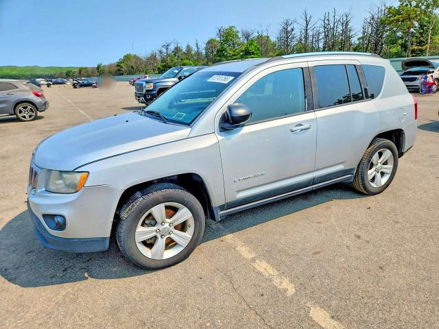 JEEP COMPASS 2011 with VIN 1J4NT1FB6BD241062 - Photo from auction