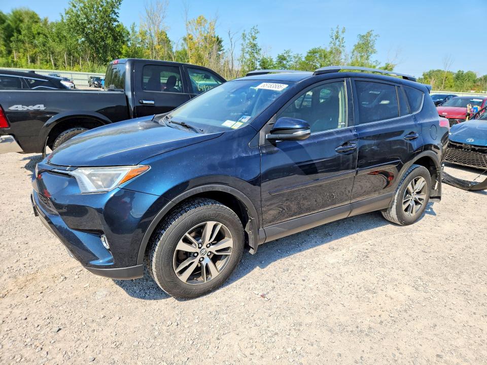 TOYOTA RAV4 2017 with VIN JTMRFREV0HJ171111 - Photo from auction