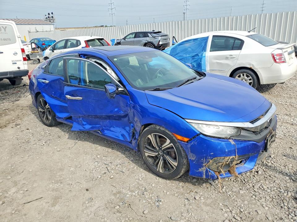 Photo 4 from auction – 2016 HONDA CIVIC with VIN 19XFC1F95GE036085