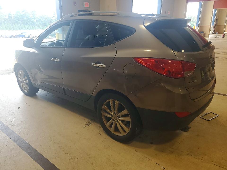 Photo 2 from auction – 2010 HYUNDAI TUCSON with VIN KM8JUCAC1AU047207