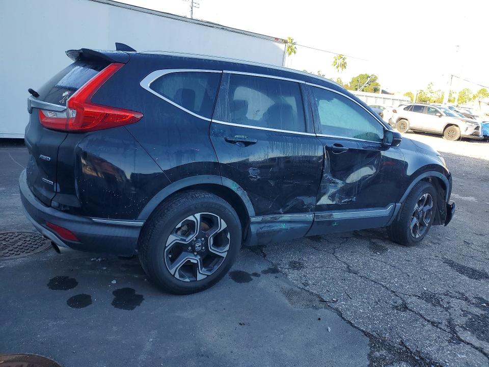 Photo 3 from auction – 2018 HONDA CR-V with VIN 7FARW2H93JE038530