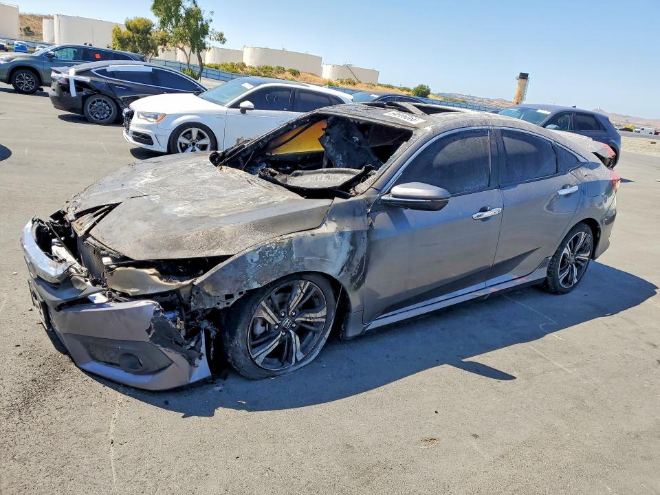 HONDA CIVIC 2016 with VIN 19XFC1F94GE214410 - Photo from auction