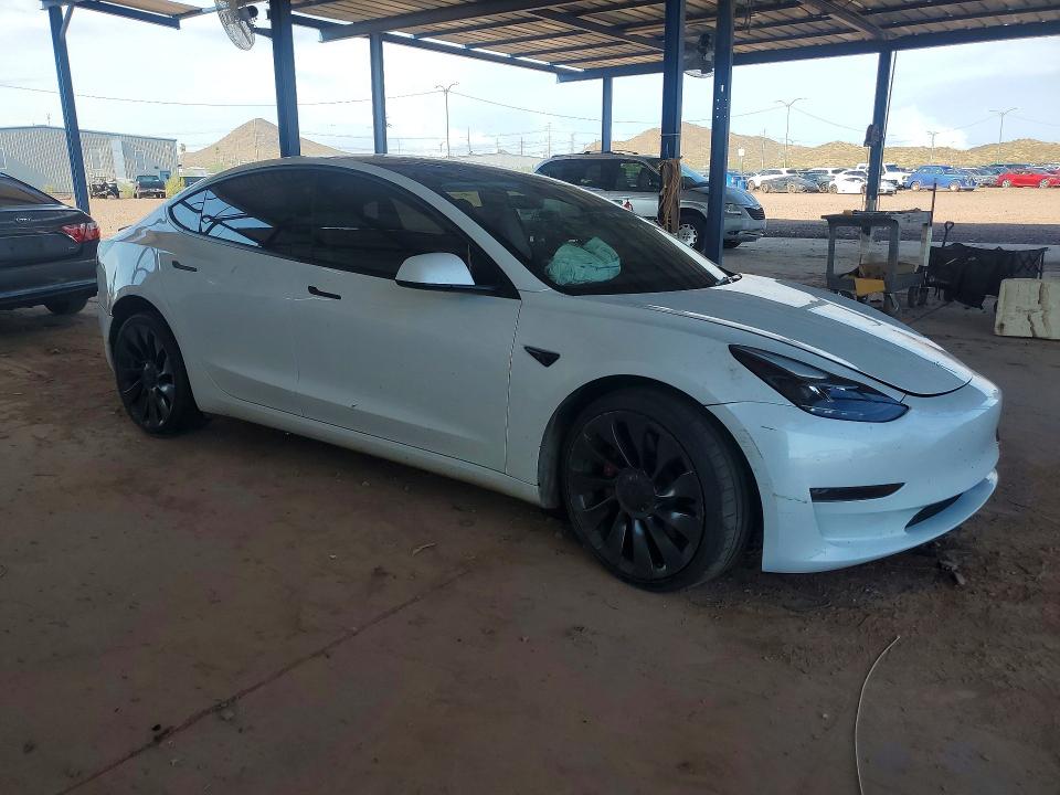 Photo 4 from auction – 2023 TESLA MODEL 3 with VIN 5YJ3E1EC4PF497329