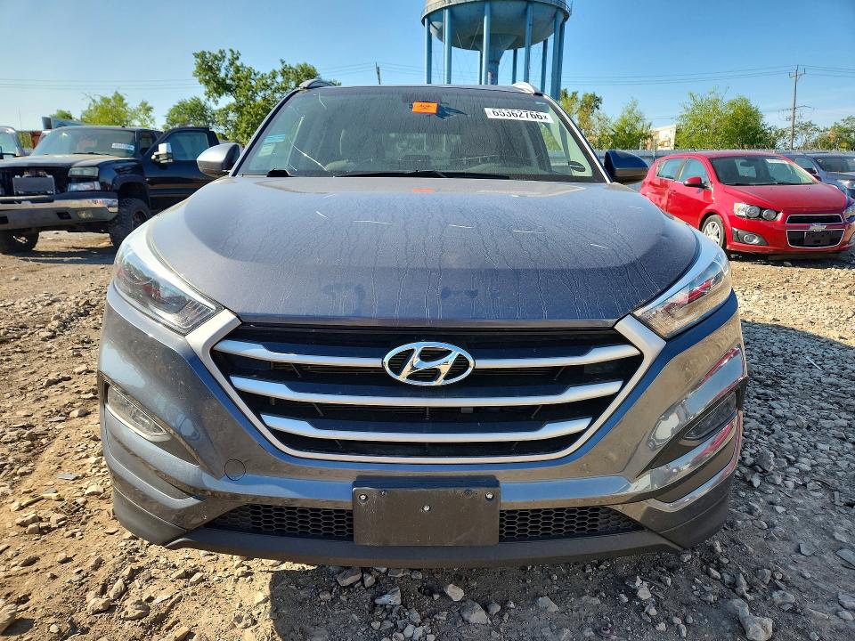 Photo 5 from auction – 2018 HYUNDAI TUCSON with VIN KM8J33A4XJU808912