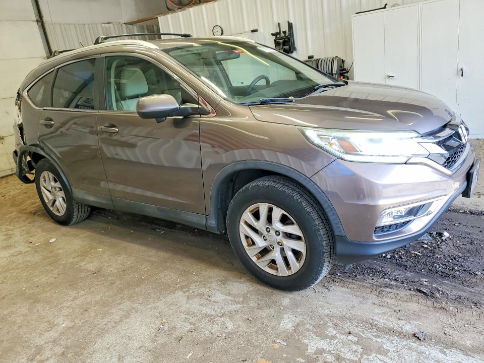 Photo 4 from auction – 2016 HONDA CR-V with VIN 2HKRM4H56GH721892