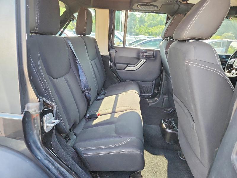 Photo 11 from auction – 2014 JEEP WRANGLER UNLIMITED with VIN 1C4BJWFG5EL133663