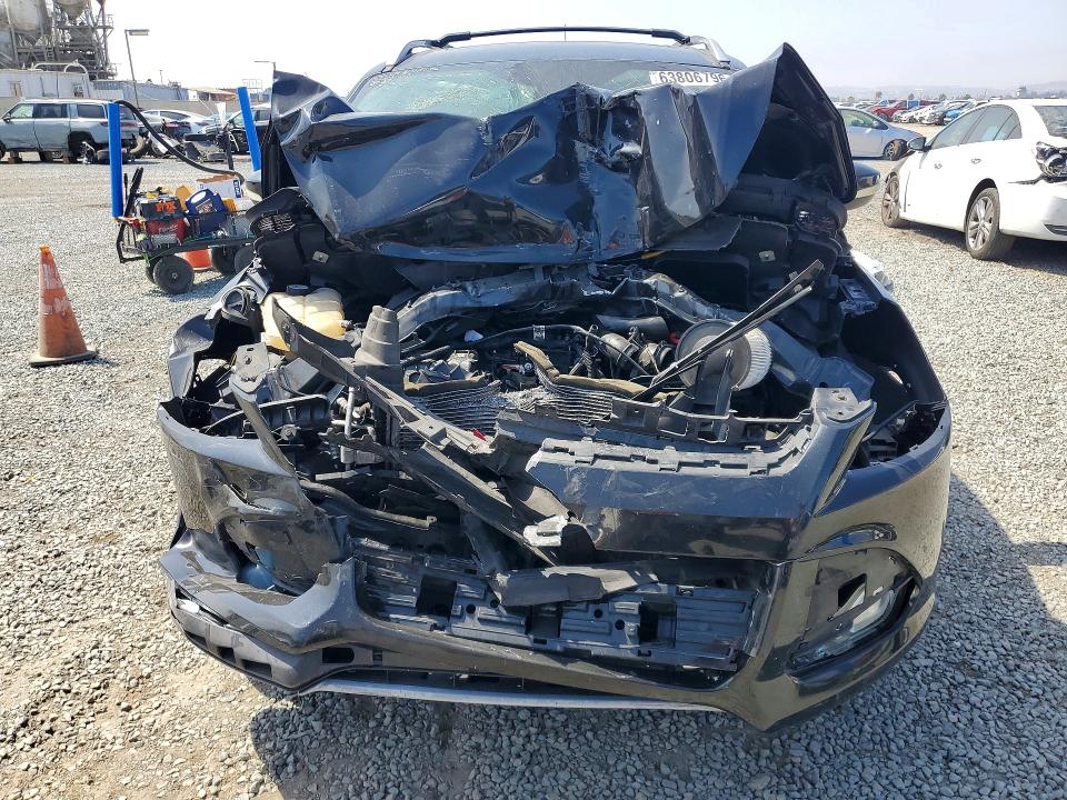 Photo 5 from auction – 2014 FORD ESCAPE with VIN 1FMCU9J96EUA53333