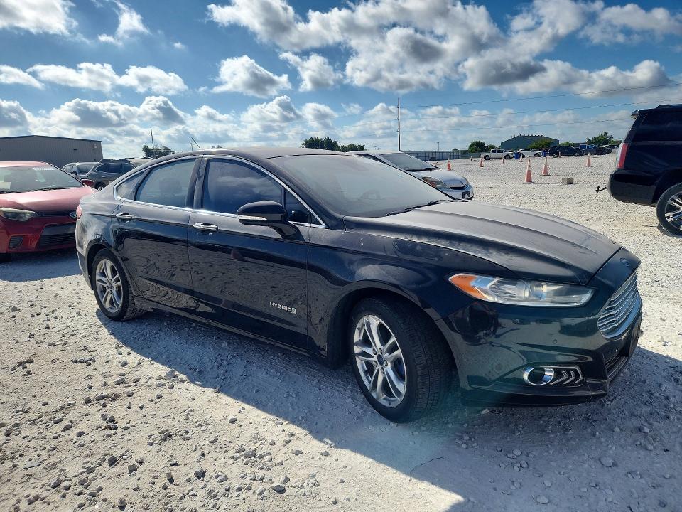 Foto 4 de la subasta – 2016 FORD FUSION con VIN 3FA6P0RU3GR145996