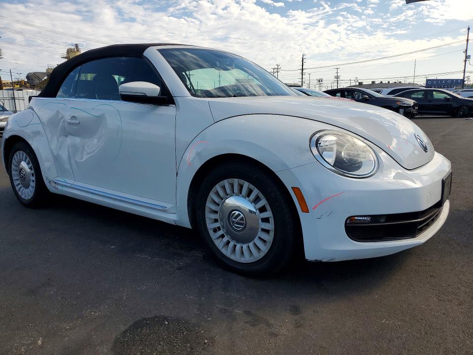 Photo 4 from auction – 2013 VOLKSWAGEN BEETLE with VIN 3VW5P7AT5DM826183