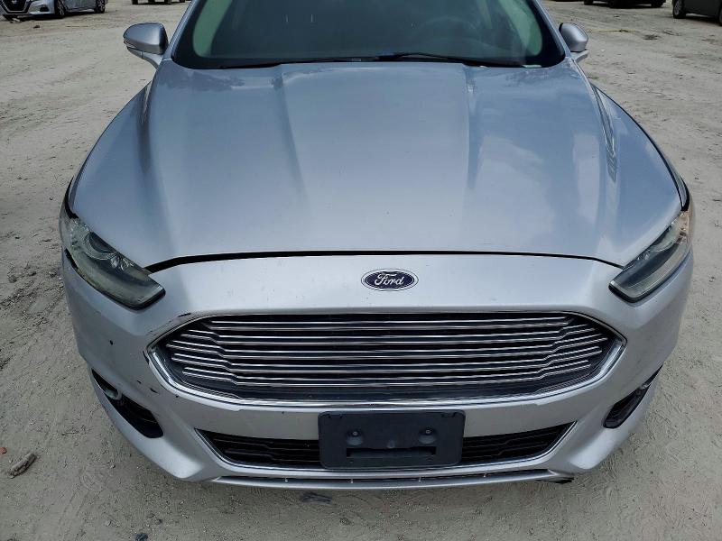 Photo 11 from auction – 2015 FORD FUSION with VIN 3FA6P0K92FR267396