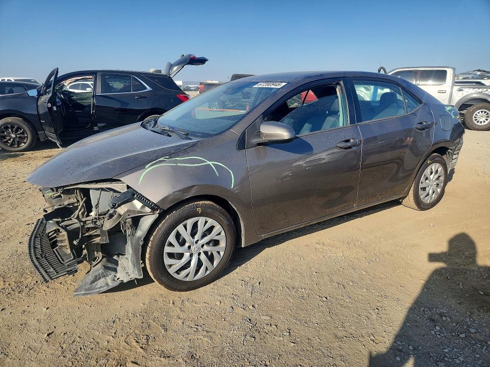 TOYOTA COROLLA 2017 with VIN 5YFBURHE4HP702776 - Photo from auction