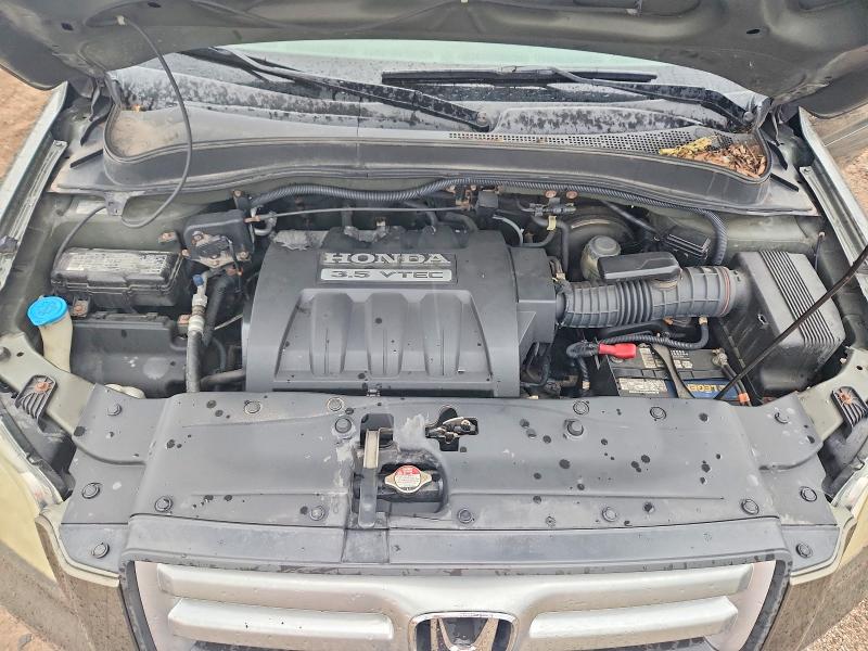 Photo 11 from auction – 2006 HONDA PILOT with VIN 5FNYF18486B029853