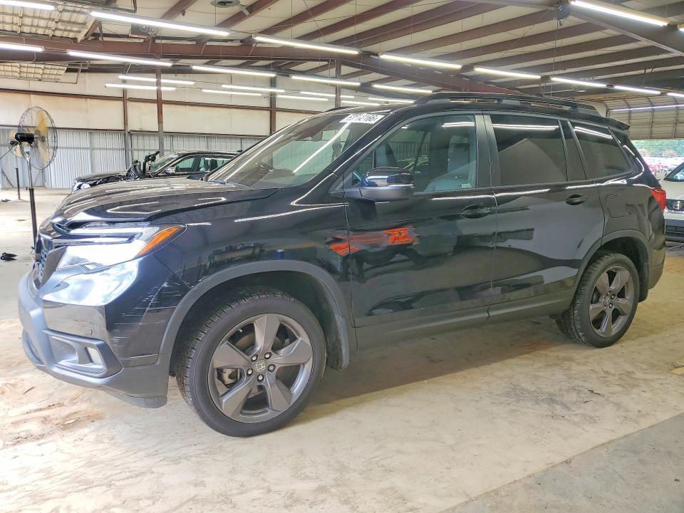 HONDA PASSPORT 2021 with VIN 5FNYF8H91MB017383 - Photo from auction
