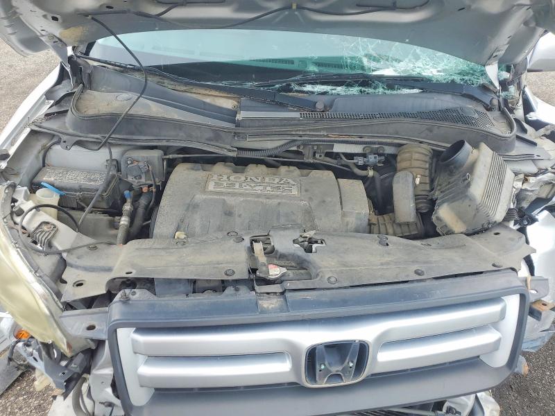 Photo 11 from auction – 2006 HONDA PILOT with VIN 5FNYF28566B015027