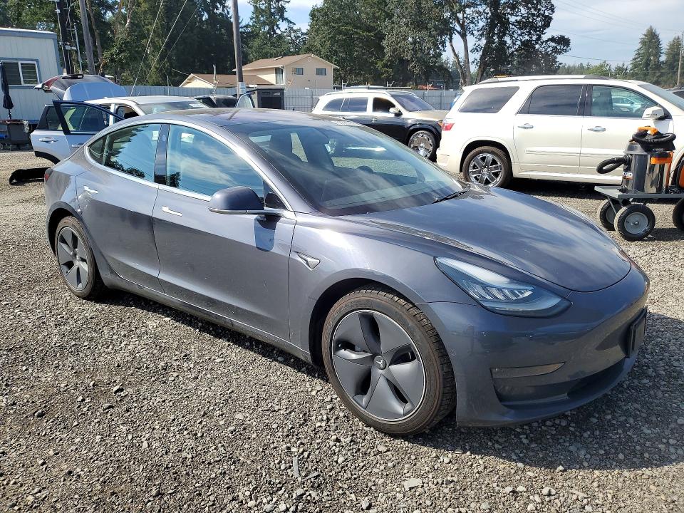 Photo 4 from auction – 2018 TESLA MODEL 3 with VIN 5YJ3E1EB8JF094145