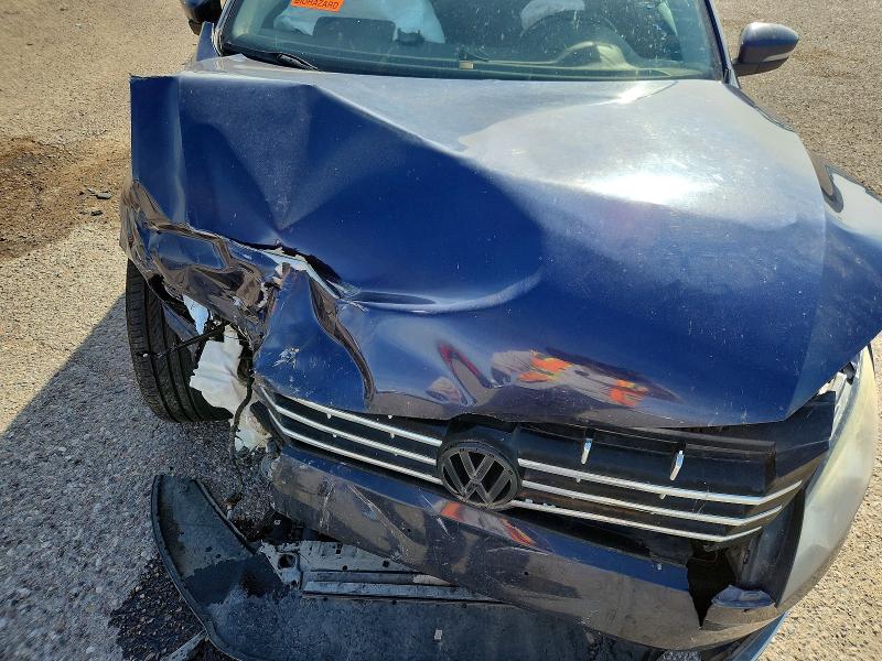 Photo 11 from auction – 2014 VOLKSWAGEN PASSAT with VIN 1VWCN7A34EC111511