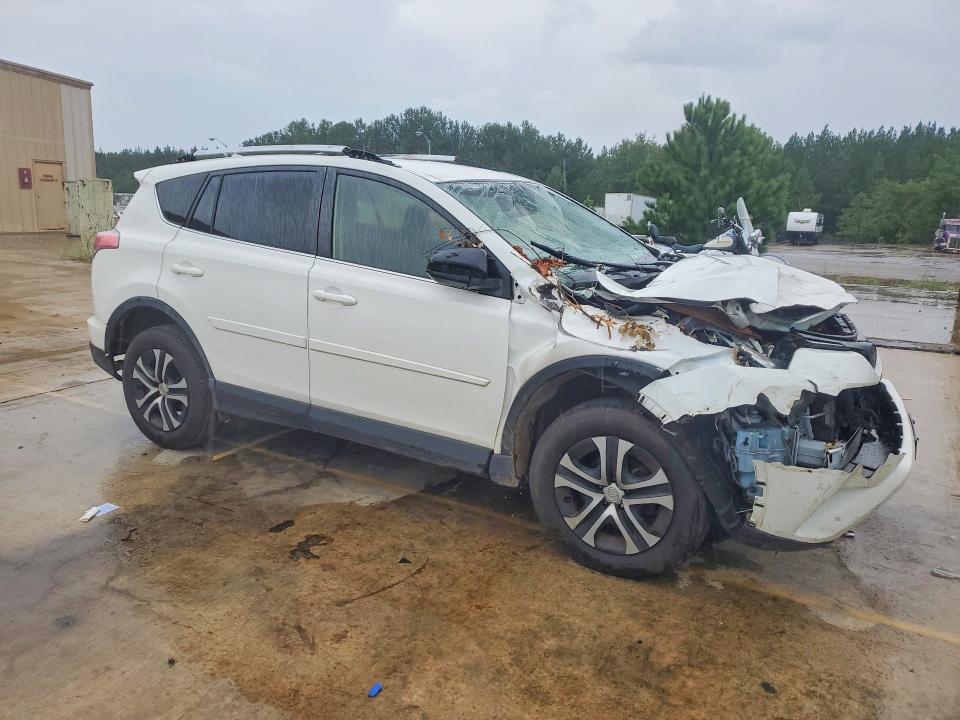 Photo 4 from auction – 2016 TOYOTA RAV4 with VIN JTMZFREV9GJ099565