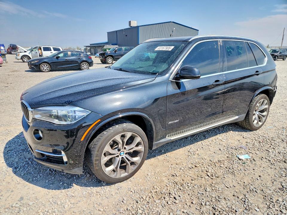 BMW X5 2014 z numerem VIN 5UXKR0C5XE0H19609 - Zdjęcie z aukcji