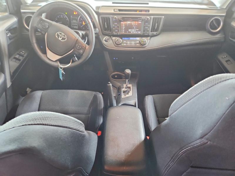Photo 8 from auction – 2018 TOYOTA RAV4 with VIN 2T3RFREV3JW719979